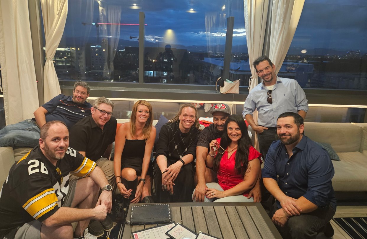 Friends gathered at the annual 2025 football pool celebration